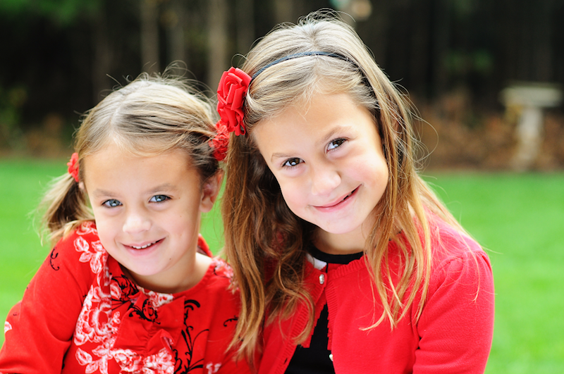 Two smiling young girls